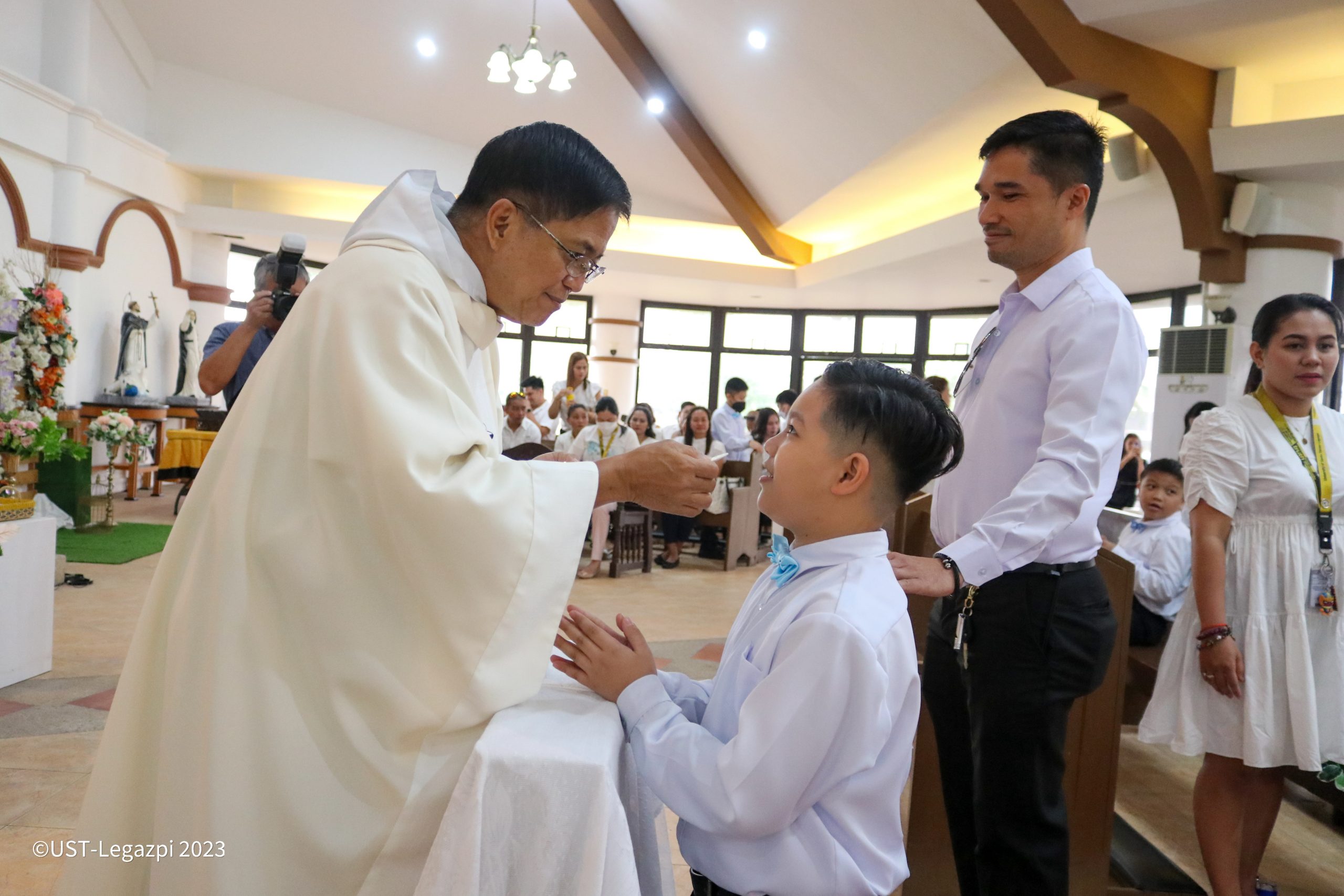 CCM LEADS FIRST HOLY COMMUNION RITES FOR PSE - University of Santo ...